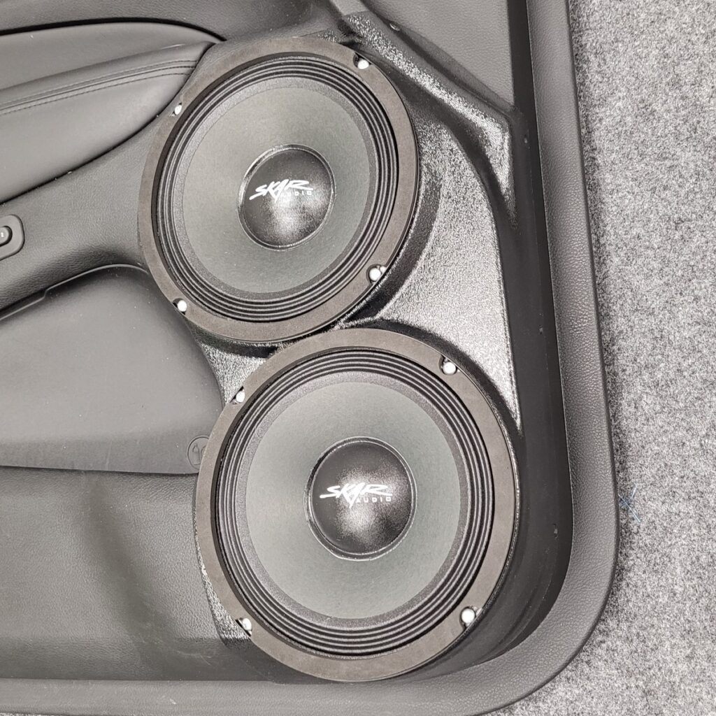 right 1 Speaker Upgrade for the Front Door of your 2011-2023 Dodge Durango, Jeep Grand Cherokee. Easy installation of a Dual 8" Midrange for the most powerful car stereo possible.